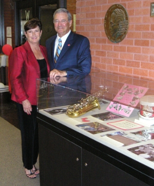 President Emeritus Dr. Jimmy Simmons and Susan Simmons with 2013 library exhibit